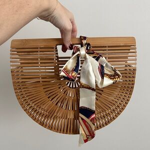 Elegant Bamboo Clutch with Silk Scarf Accent